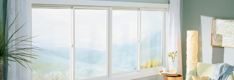 Gliding_Windows_Bedroom energy-efficient sliding window home interior